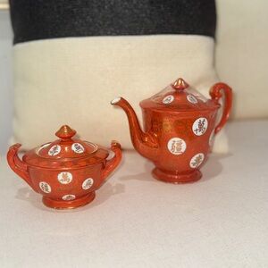 Intricate Red and Gold Teapot Set